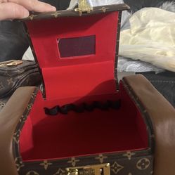 Crossbody’s backpack jewelry box $130