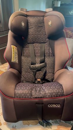 Smoke free pet free no accident Cosco Easy Elite All-in-1 Convertible Car Seat Adjustable car seat with a black and gray geometric pattern and red pi