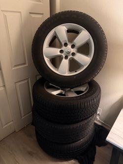 OEM Ram 1500 20-inch 5-Lug on 33’s Wheels  Tires Goodyear 275/60R20"