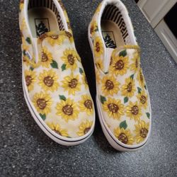 VANS. SUNFLOWERS   WOMEN SZ. 9.  MEN 7.5.     40 DOLLARS