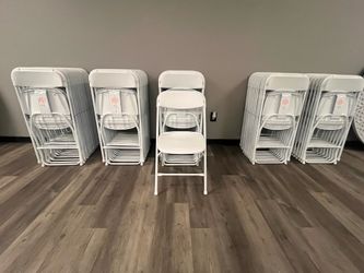 White standard folding chairs
