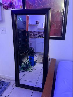 Mirror like new about 5 feet tall