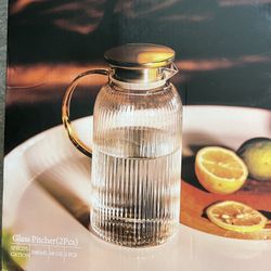2 Glass Pitchers with Lids