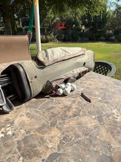 Old used PING golf clubs