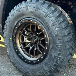 17x9 Rims And Tires 33/1250/17 MT