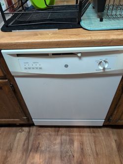 Free GE white dishwasher for scrap or resell
