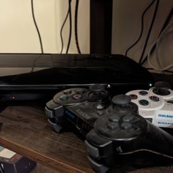 PS3 Super Slim, 19 games, 2 Controllers