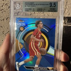 TRAE YOUNG CHECKERBOARD BLUE REFRACTOR /150 BECKETT 9.5