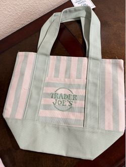 Green Trader Joe’s striped mini tote