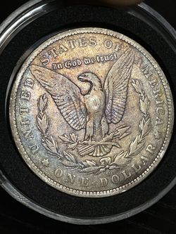 1886 O Toned Morgan Silver Dollar