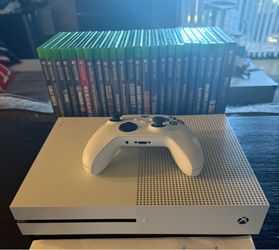 Excellent condition Xbox one S 1 Tb storage with included 1 Tb external storage. 25 games!