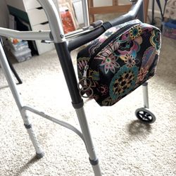 Walker-Foldable, adjustable height. 