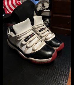 Air Jordan 11 Low White Black Red Sneakers