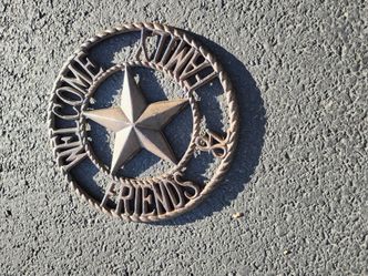 Heavy duty cast iron "welcome family & friends"sign