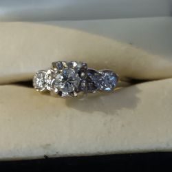 Brlliant .67 Round DIamond White Gold Ring With Two Baguettes