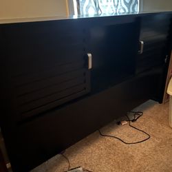 Dresser With Several Drawers And Also Have Another Piece Where You Can Store Things With Sliding Doors