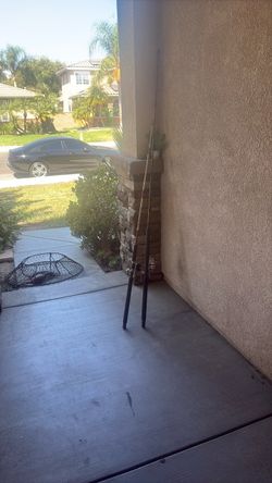 2 salt water fishing poles and reels