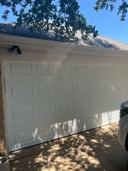 Garage door and op