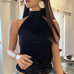 Cute black halter with lace waist. Ties at the neck
