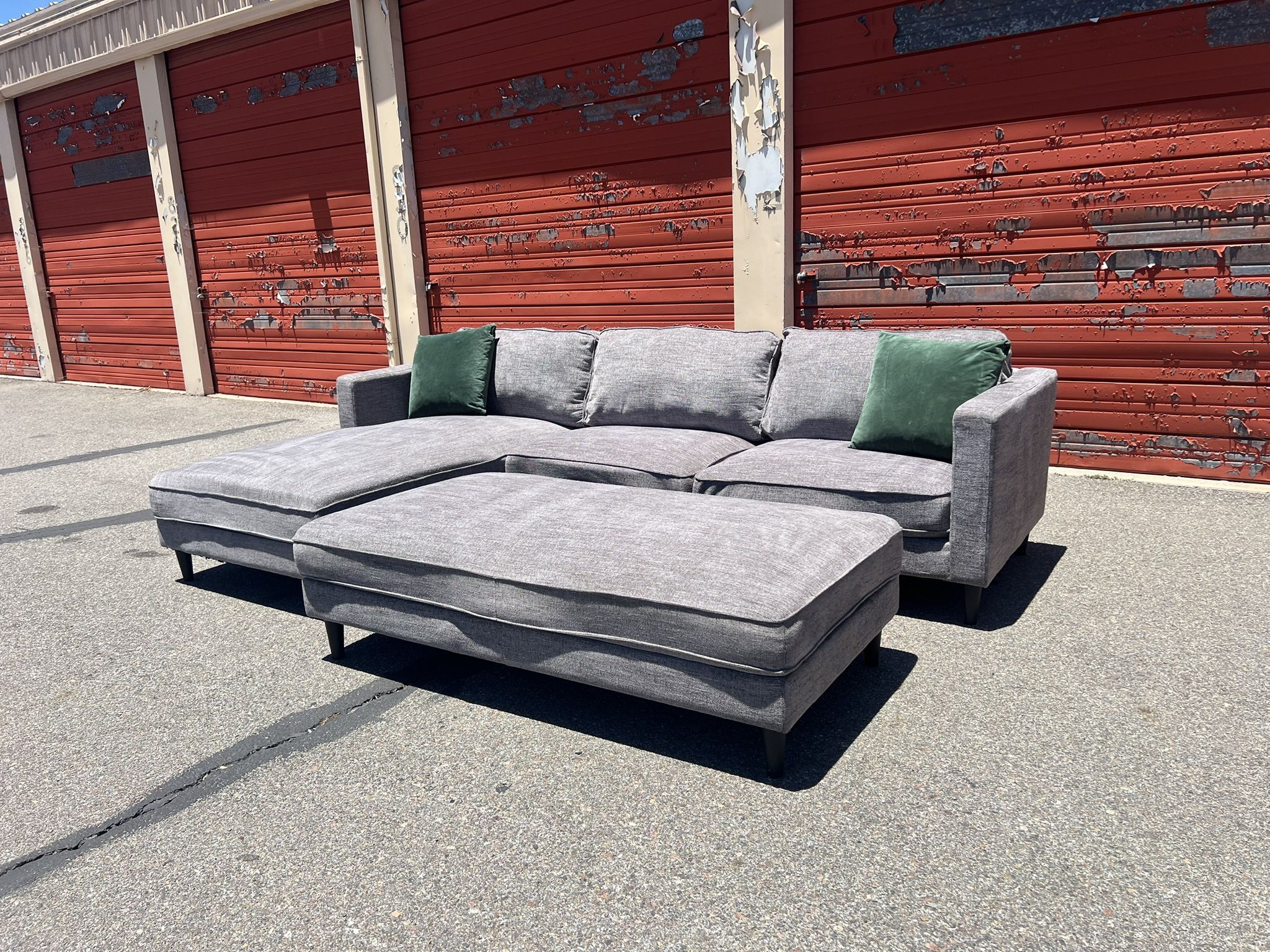 Living Spaces Gray Sectional Sofa Chaise With Ottoman
