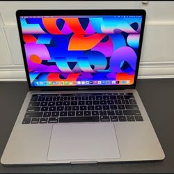 MacBook Pro 2018 256Ssd with Touch Bar screen (excellent condition)