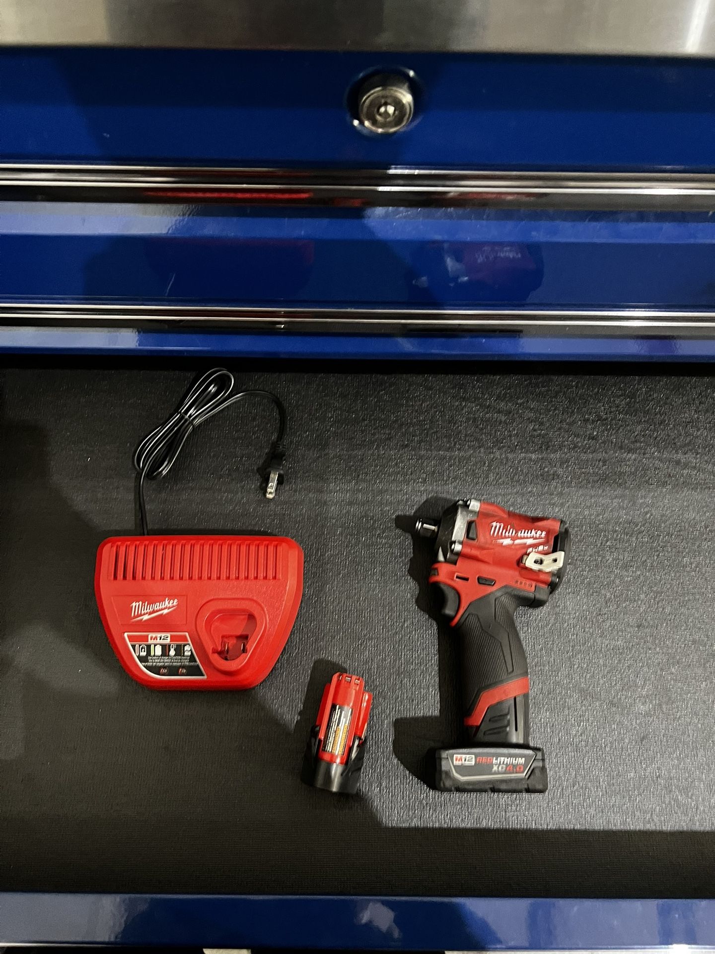 Milwaukee 1/2in Cordless, Charger, And Extra Battery