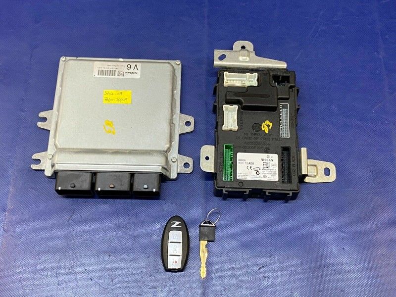 OEM USED 09 10 370Z MANUAL ECM BCM W/ KEY FOB