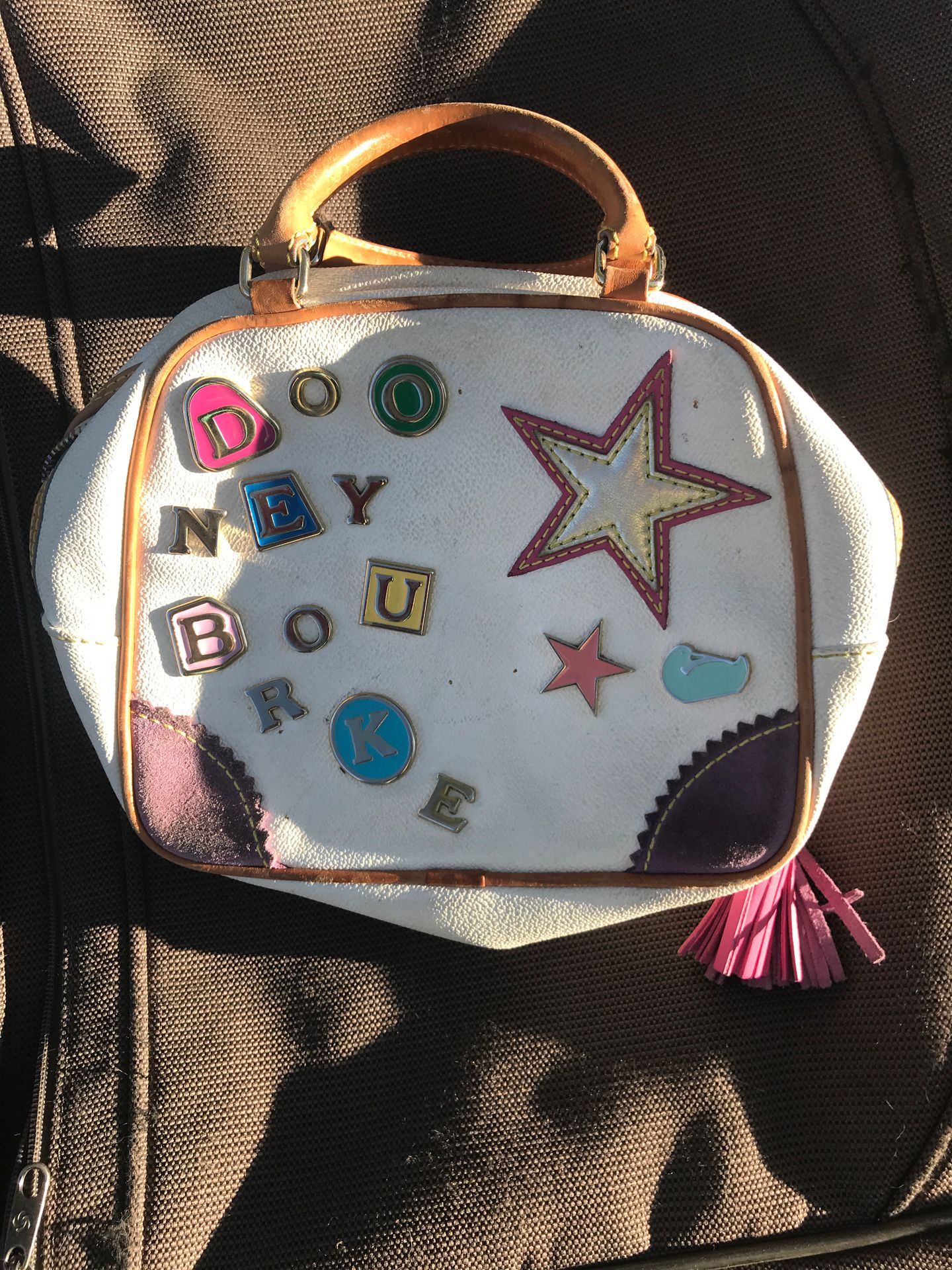 What a fun Dooney and Bourke purse!