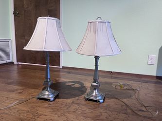 2 silver lamps