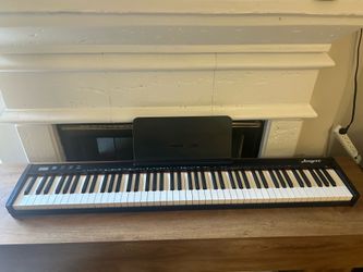 Amyove 88-Key Semi-Weighted Digital Piano Keyboard w/ Sustain Pedal, Headphones & Carrying Case