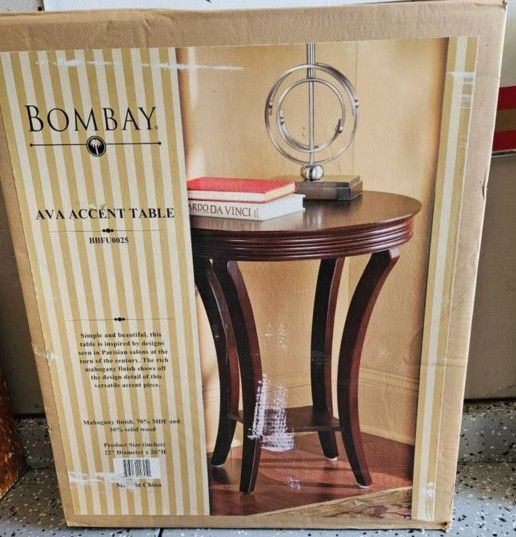 Bombay Ava Accent Table mohagany color.
22" diameter, 26" Height