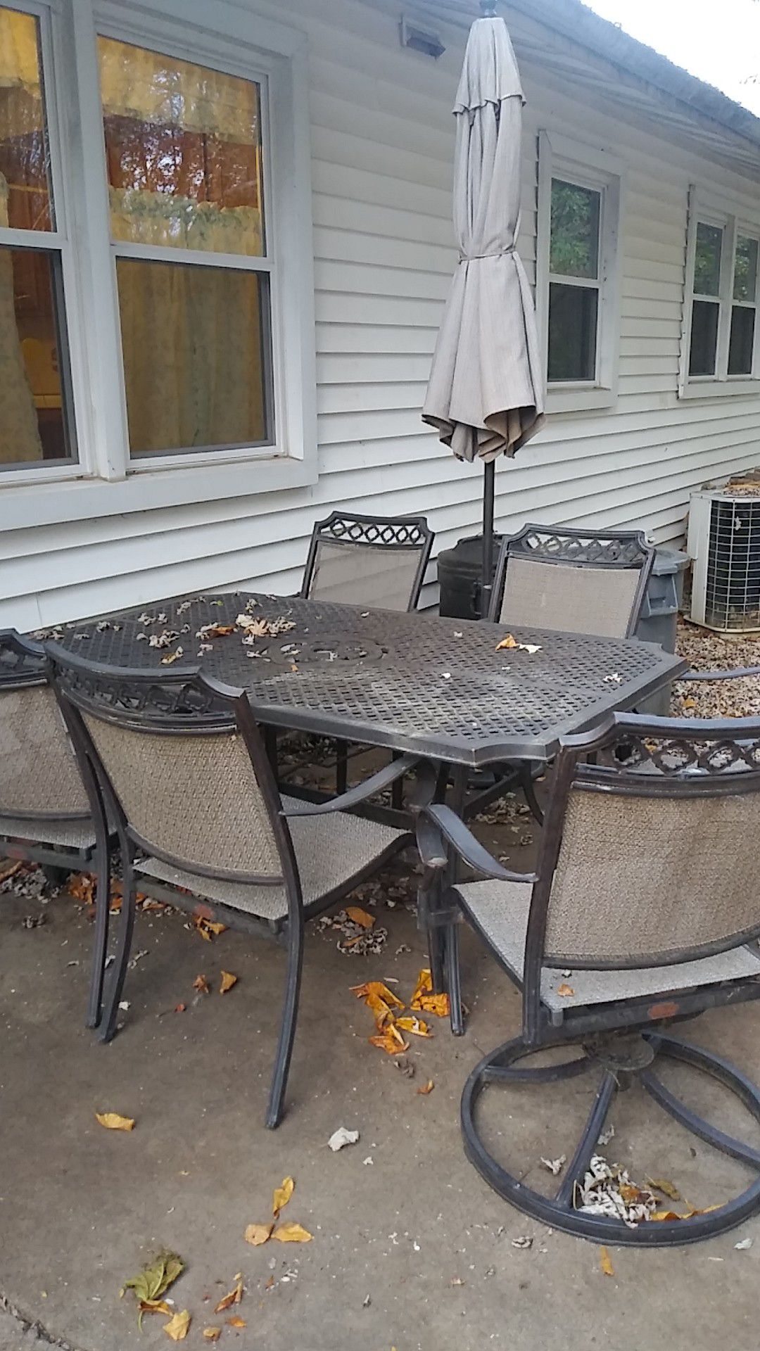 Back yard table set with umbrella