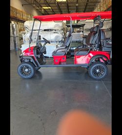 BRAND NEW GOLF CART RED BLACK INTERIOR SOUND BAR 6 seater