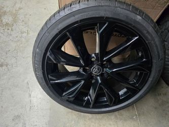 4 new Toyota Corolla 18x8 factory Rims and new Michelin tires.