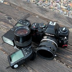 Nikon N2000 body With 135mm And 28mm Ais 2.8 Lens