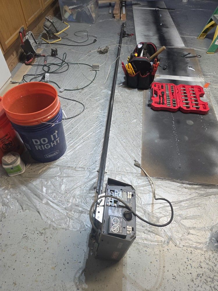 Garage Door Opener With Sensor And Opener.