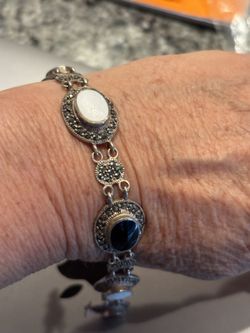 Vintage sterling bracelet with panels of onyx and mother of pearl 