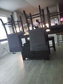 Dark Wood Dining Table with Upholstered Chairs