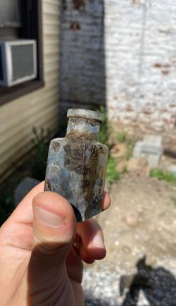 Vintage glass bottles found privy!