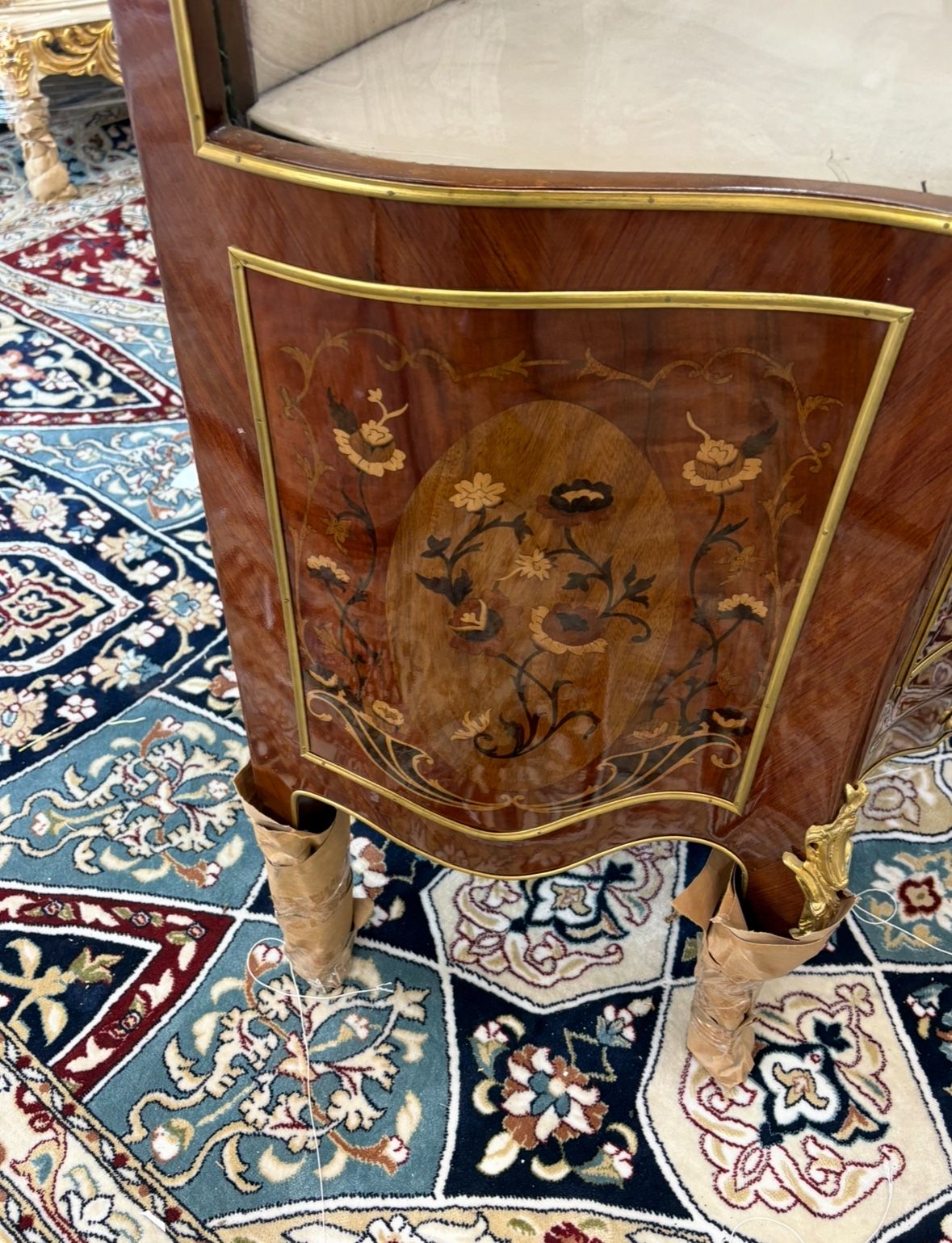 Curio Louis XVI Vitrine LOOK UP This is a Louis XVI style vitrine. TIME PERIOD Late 20th Century ORIGIN France HISTORY This vitrine is crafted in the