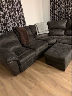 Sectional couch dark color