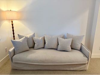 Light grey slipcover sofa