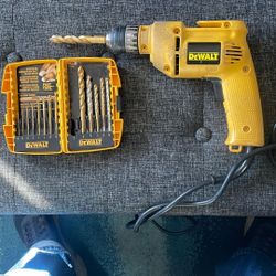 DeWalt electric drill with drill bits
