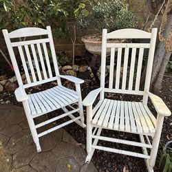 Two wood rocking chairs