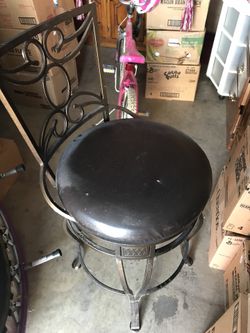Heavy metal swivel chair