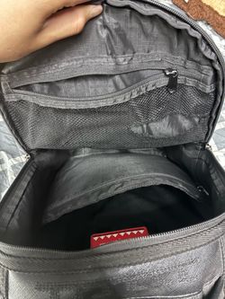Spray ground backpack