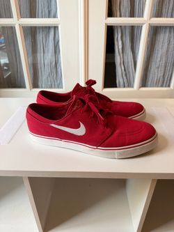 These are Nike SB Zoom Stefan Janoski Canvas skate shoes in the University Red / White colorway
