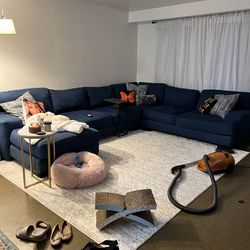 Large blue sectional couch | Living spaces | seats 7