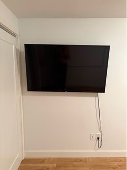 56” TCL Smart TV and wall mount