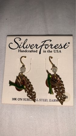 Brand new earring silver forest paid 18 and I will take 12